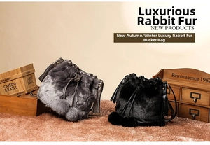 Detail of grey gradient and black faux fur bucket bags with drawstring and pom-poms