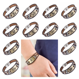 Set of 12 vintage leather zodiac bracelets with bronze constellation charms for men and women