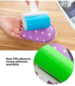 Washable TPR lint roller cleaning dust and hair from slippers on a wooden surface