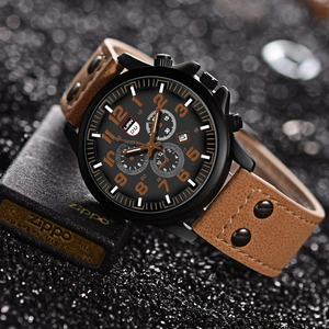 Detailed shot of men's quartz watch with brown PU leather strap and a black dial