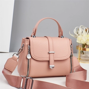 Pink lychee grain leather handbag with wide strap and silver hardware for women
