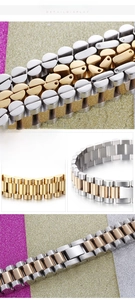 Macro detail of two-tone stainless steel watch-style bracelet with President link design