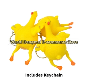 Macro detail of yellow chicken squeeze toy with metal keychain for stress relief