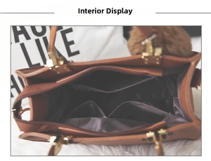 Internal view of brown faux leather handbag showing zippered pocket and satin lining