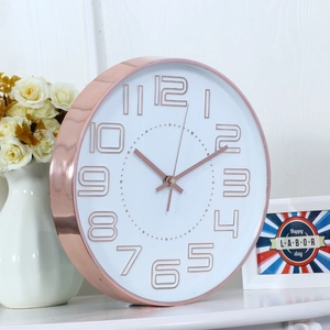 Modern 12 inch wall clock with rose gold metal frame and 3D numeric dial for home decor