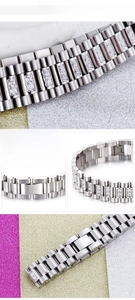 Detailed close-up of men's stainless steel bracelet with triple-row crystal inlay design