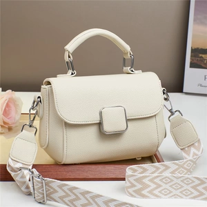 Chic cream white litchi pattern leather tote bag with stylish woven wide shoulder strap
