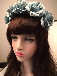 Detail of vintage grey-blue fabric rose headband for Mexican party costume
