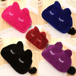 Detailed view of cat-ear plush coin purses in five colors with eyelash embroidery