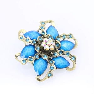 Vintage water drop flower brooch with blue resin stones and sparkling rhinestones