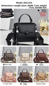 Detail view of leather handbag with three-layer interior compartments and size 22x11x17cm