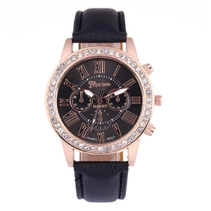 Close-up of black dial watch with rose gold Roman numerals and rhinestone bezel
