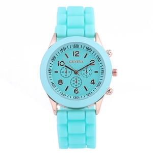 Detailed close-up of Geneva quartz watch with mint green silicone strap and rose gold dial