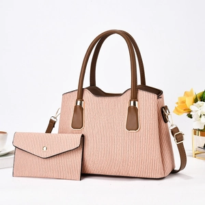 Nude textured tote and envelope clutch set with brown trim for elegant daily style