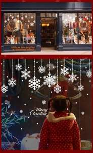 White snowflake Christmas window decals with Merry Christmas text for glass display