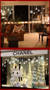 Detail of PVC white snowflake window stickers and Merry Christmas decals for shop windows