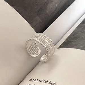 Detail view of S925 sterling silver multilayer beaded ring with clear hallmark engraving