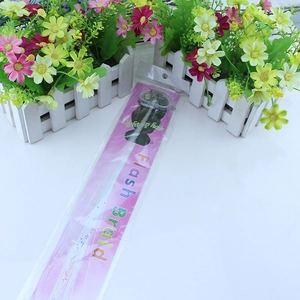 Detail of LED fiber optic flash braid toy in individual packaging for parties