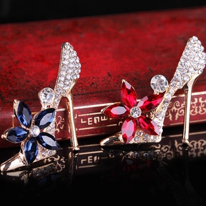 Elegant gold high heel brooches with blue and red crystal flowers and sparkling rhinestones