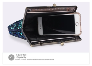 Detail view of vintage sequin evening bag showing spacious interior with a smartphone