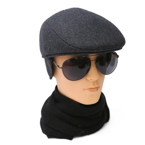 Men's wool blend winter flat cap with ear flaps in dark grey, warm insulating headwear