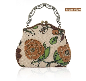 Detail of vintage linen handbag with intricate rose beadwork and bronze floral handle
