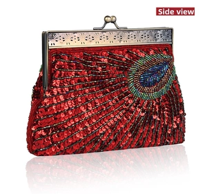Side view of red vintage beaded evening bag featuring colorful peacock feather embroidery