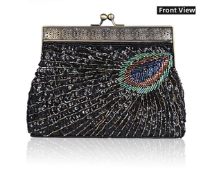 Detail of vintage evening bag featuring peacock feather beadwork and bronze metal frame