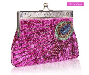 Detailed side view of fuchsia beaded evening clutch with peacock embroidery and metal frame
