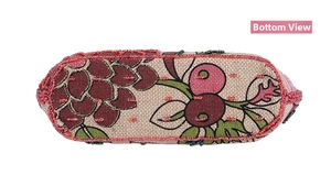Detailed bottom view of vintage linen bag featuring exquisite bead embroidery and fruit prints