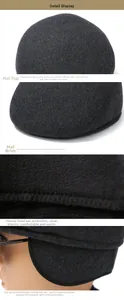 Detail view of winter wool cap with earflaps, soft fleece lining and thick texture