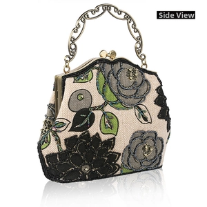 Side view of handmade beaded rose embroidery on a vintage linen evening handbag