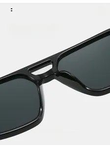 Detail of comfortable integrated nose pads on black square frame sunglasses