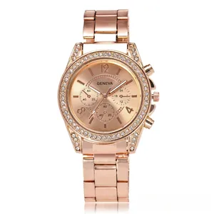 Detailed close-up of rose gold Geneva watch with rhinestone bezel and metal chain strap