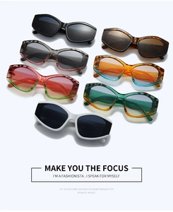Flat lay of trendy polygon sunglasses in multiple colors with thick rectangular frames