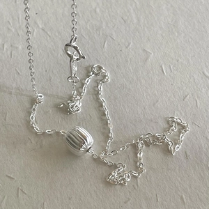 Minimalist S925 sterling silver necklace featuring a 3D pumpkin bead pendant and fine chain