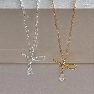 Collier nœud en argent 925 et or avec pendentif en zircone goutte d'eau élégant