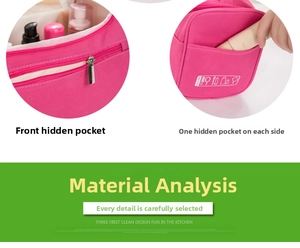Detail view of pink toiletry bag with zipper compartments and side pockets for storage