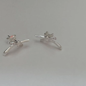 Minimalist 925 sterling silver bow knot stud earrings with cubic zirconia stones