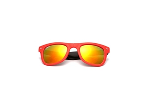 Close-up of folding red frames with orange gradient reflective lenses for portable sunglasses