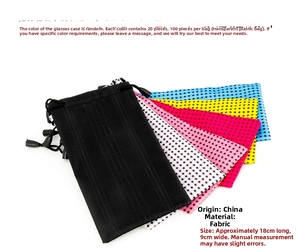 Close-up of colorful checkered drawstring pouches for sunglasses in various colors