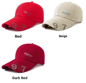Detailed view of men's wide brim baseball caps in red, beige and maroon colors