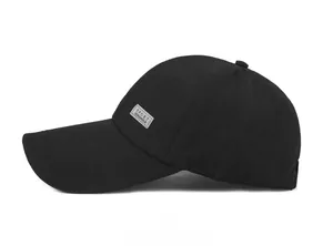 Detail of the long-brimmed black baseball cap side view showing the SPORT patch detail