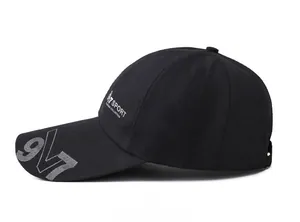 Detail of black sports baseball cap showing 97 SPORT printed text and mesh patterns