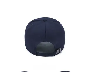 Detail view of navy blue canvas baseball cap back with adjustable metal buckle