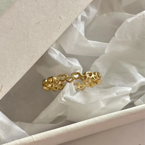Elegant 925 sterling silver heart-shaped gold ring featuring an openwork linked design