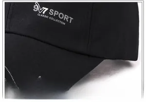 Close-up of black cotton baseball cap with silver V7 Sport Classic print and stitching