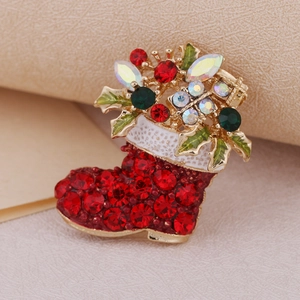 Elegant Christmas stocking brooch with sparkling red rhinestones and golden leaf accents
