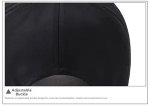 Detail of the adjustable strap on a black canvas baseball cap showing durable texture