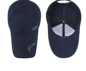 Detail view showing the navy canvas baseball cap interior and side sport embroidery